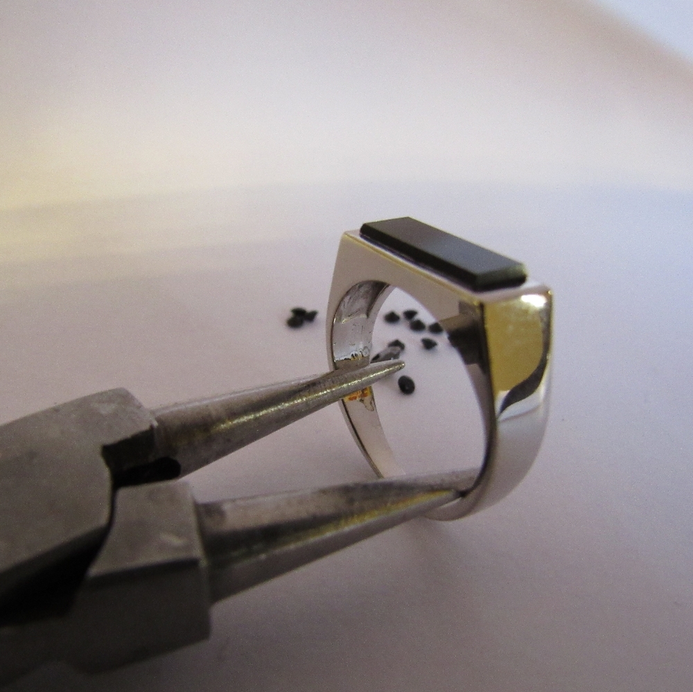 14K white gold with black Onyx.